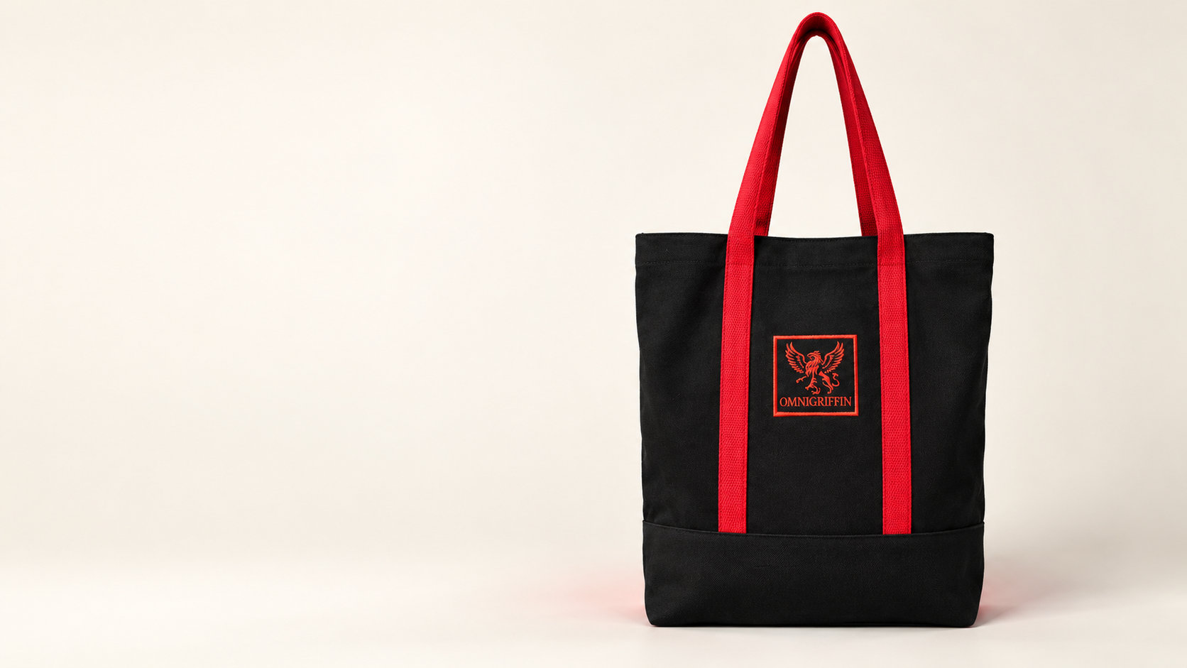 Black Omnigriffin denim utility tote with red webbing handles